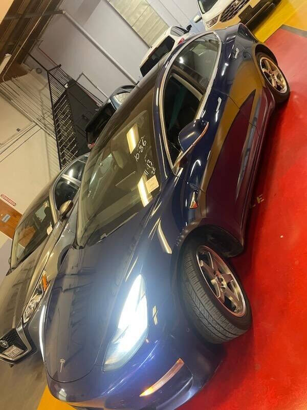 tesla model 3 2018 5YJ3E1EB8JF146521 image tesla model 3 2018 5YJ3E1EB8JF146521 image